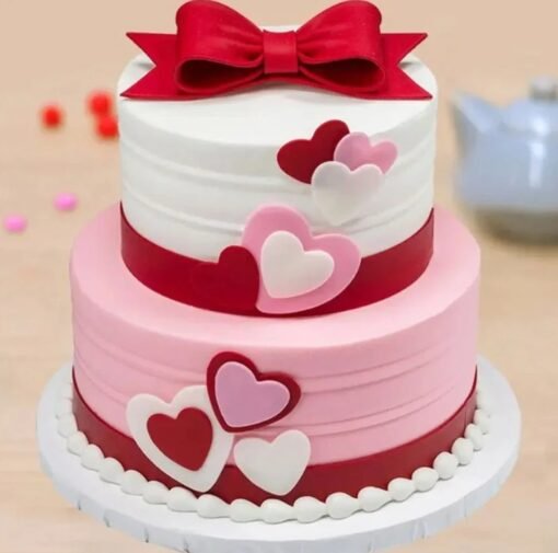 Two-Tier Fondant Cake with elegant fondant decorations, perfect for weddings, anniversaries, and other special celebrations.