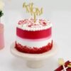 Velvet Love Mother’s Day Cake — elegant red velvet cake topped with heart decorations, perfect for celebrating Mom.