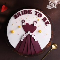 Elegant bride-to-be dress cake with fondant gown design for bridal shower