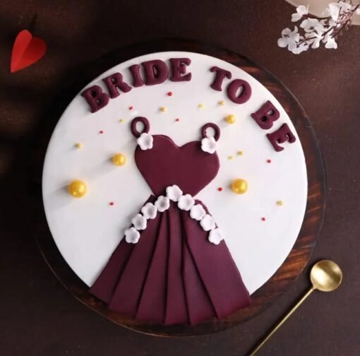 Elegant bride-to-be dress cake with fondant gown design for bridal shower