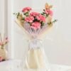 Mother’s Day Carnations Bouquet with pink, red, and white carnations wrapped beautifully.