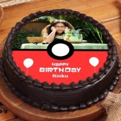 Poke Ball-themed birthday cake with custom photo for Pokémon party.