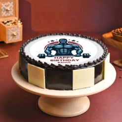 Gym-themed birthday cake with bodybuilder design and fondant weights