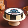 Gym-themed birthday cake with bodybuilder design and fondant weights