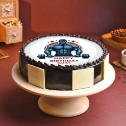 Gym-themed birthday cake with bodybuilder design and fondant weights