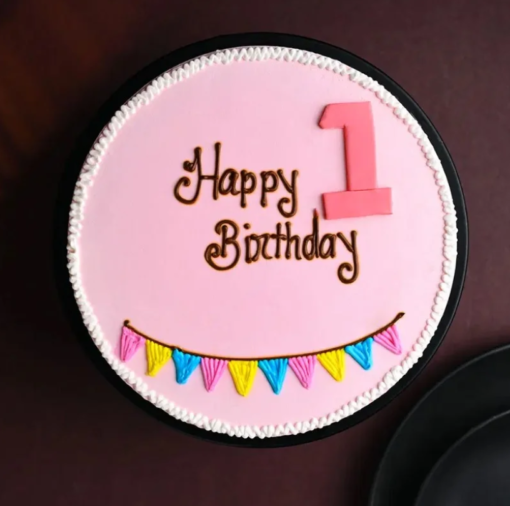 Classic birthday cake with candles and colorful decorations for party celebration