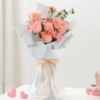 Romantic floral arrangement with red and pink roses