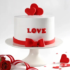 Love Hearts Cake-Romantic cake with heart decorations and cream frosting