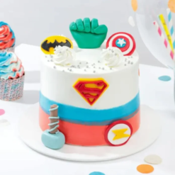 Marvel Avengers-themed cake featuring superhero toppers