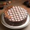Ferrero Choco Bliss Cake-Chocolate cake topped with Ferrero Rocher and hazelnut flakes