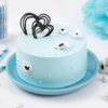 Light blue pastel cream cake with smooth frosting
