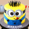 Minion-themed fondant cake with playful yellow design