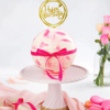 Round crystal-like pinata cake with hidden sweets inside