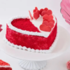 Red velvet heart-shaped cake with cream cheese frosting