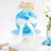Blue sky-themed pinata cake with hidden treats inside