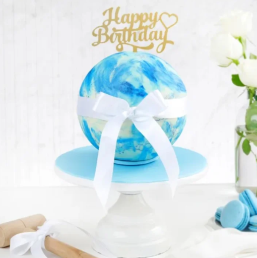 Blue sky-themed pinata cake with hidden treats inside