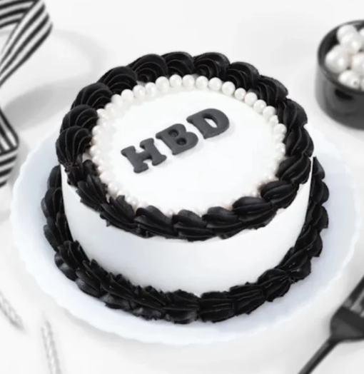 Monochrome black and white cake with elegant frosting design